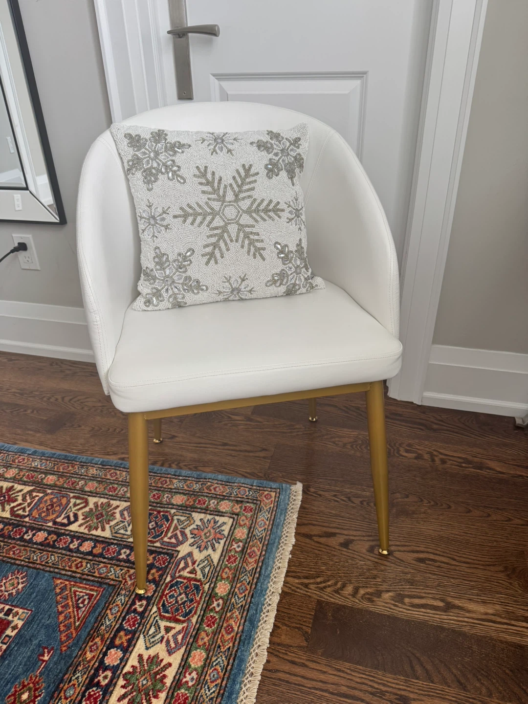 White faux leather dining chair with gold legs