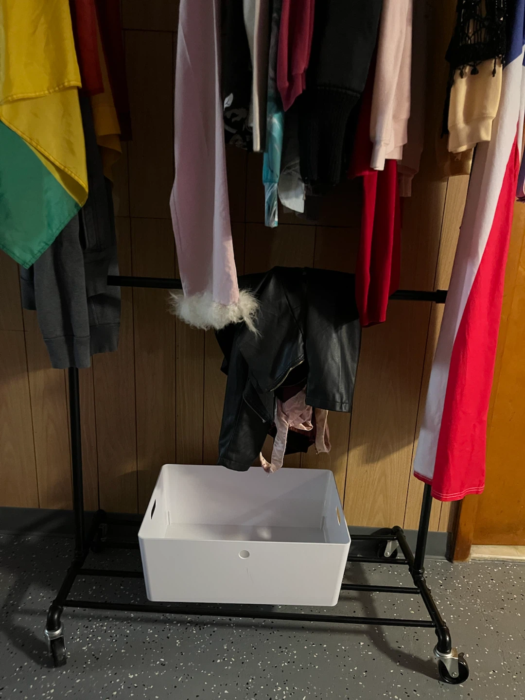 Industrial Clothing rack + white storage container