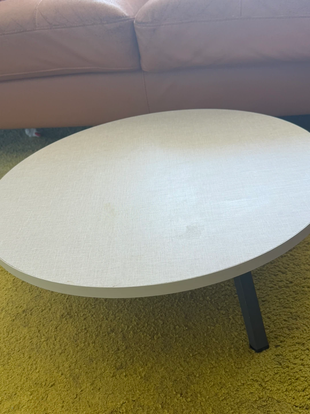 Round white side table