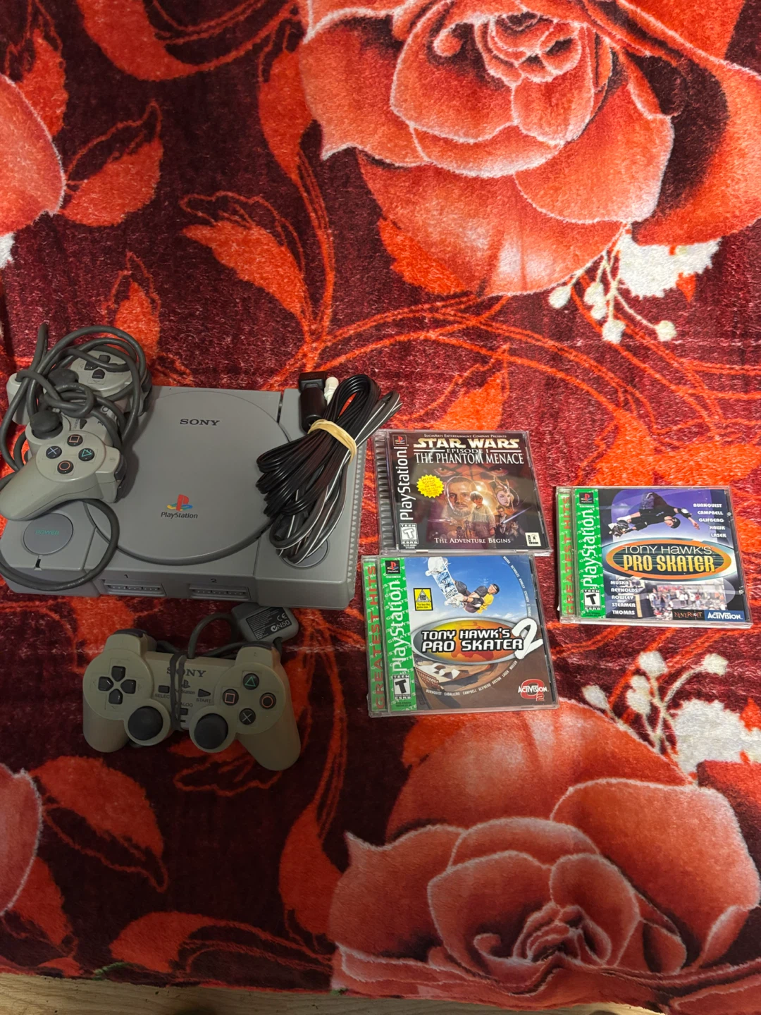 Sony PlayStation Console Bundle with Four Games