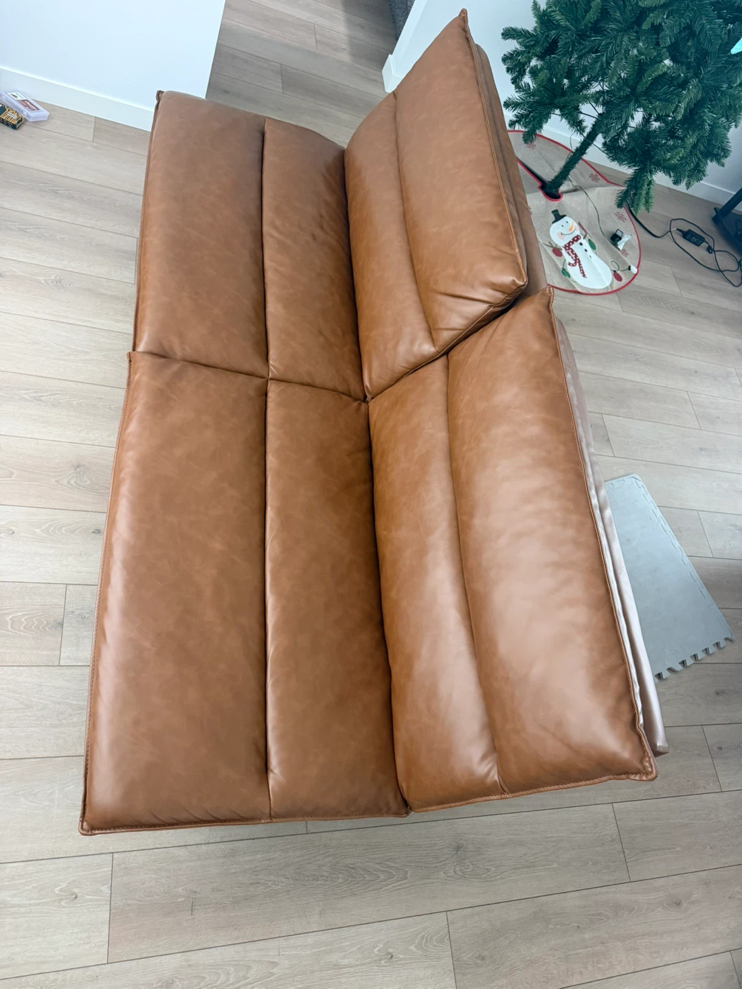 Brown faux leather futon sofa