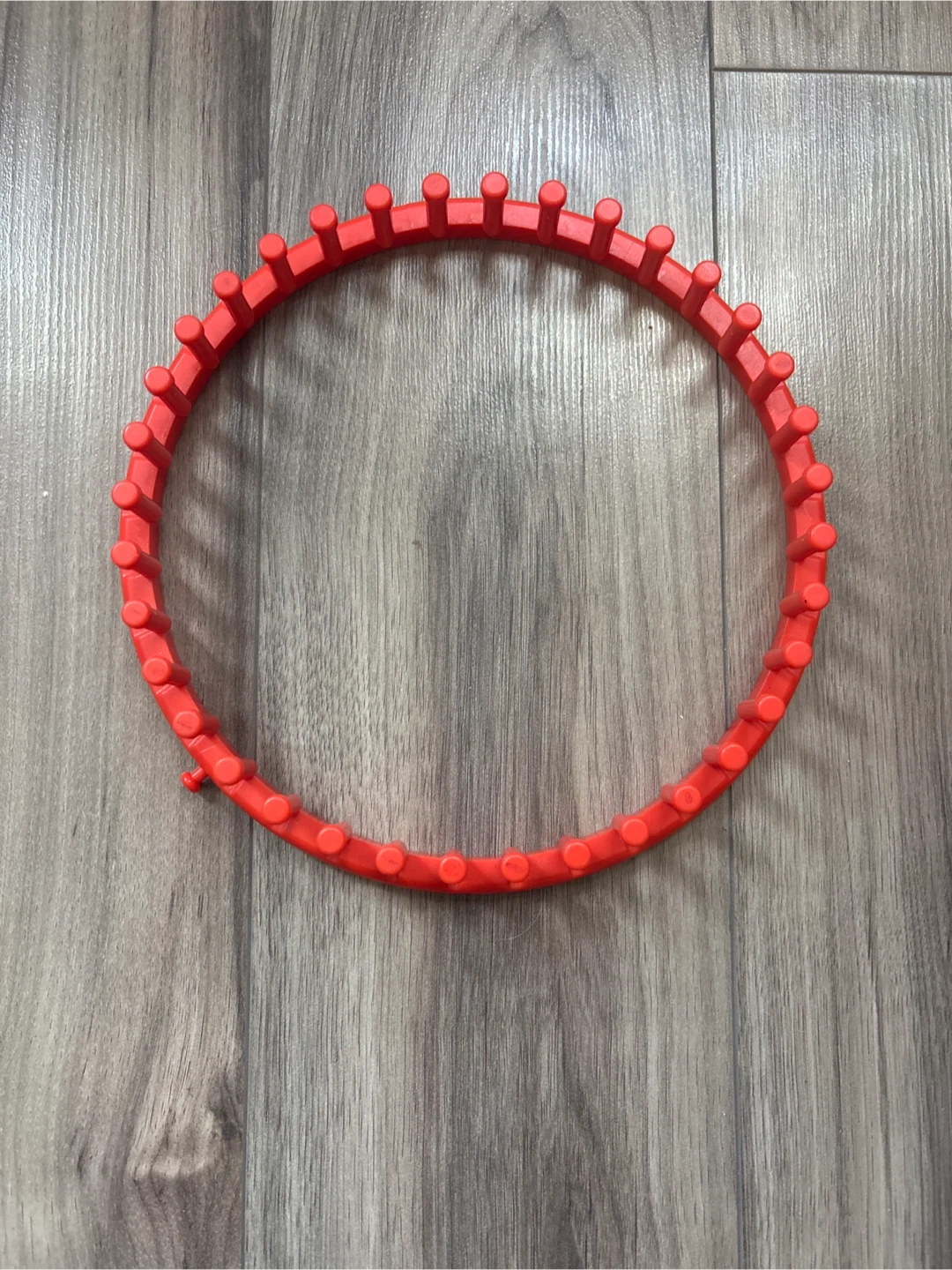 Red circular knitting loom