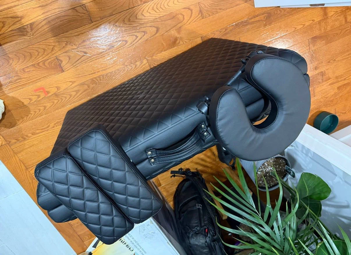 Black Quilted Massage Table with Face Cradle and Arm Rests