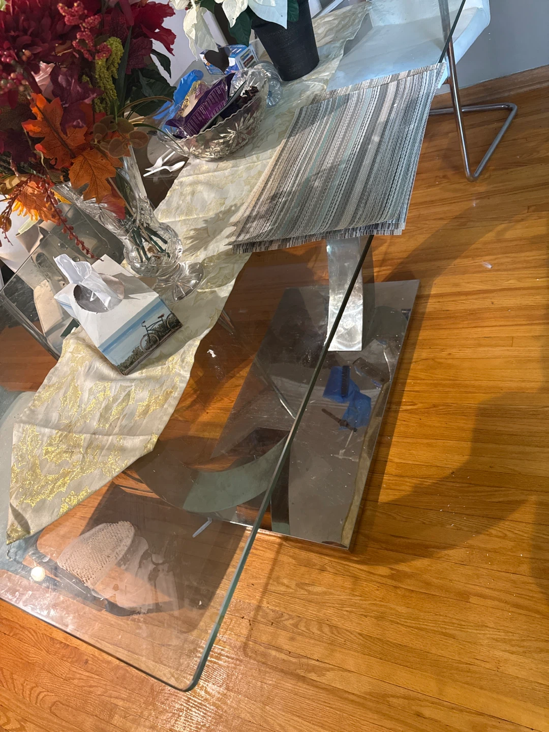 Glass top dining table with chrome base