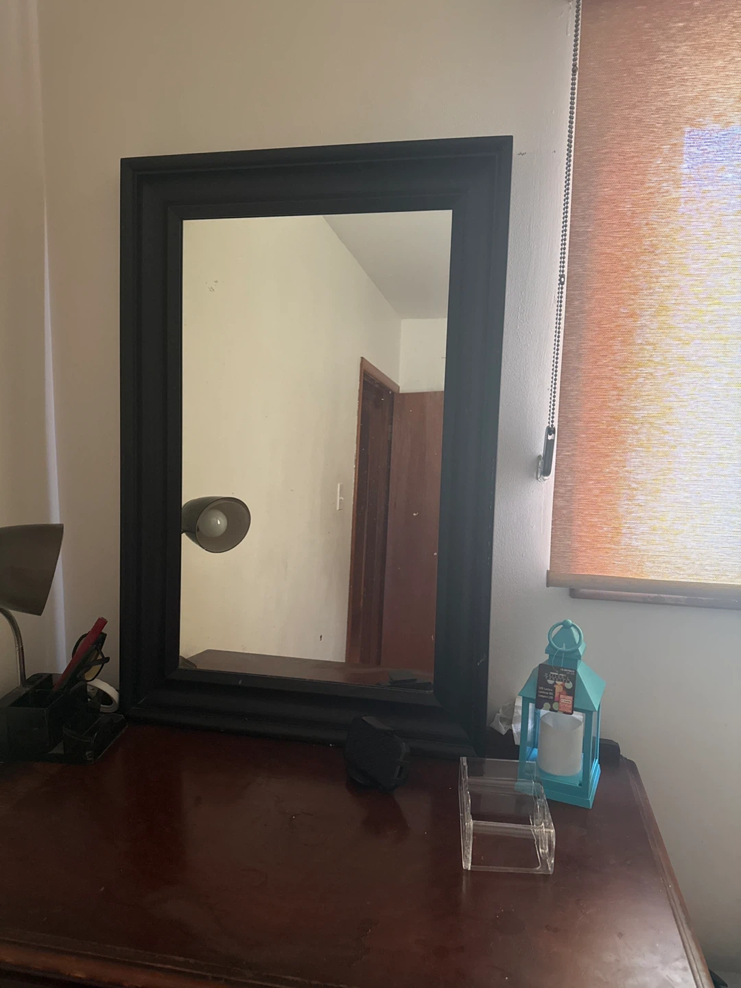 Black rectangular wall mirror