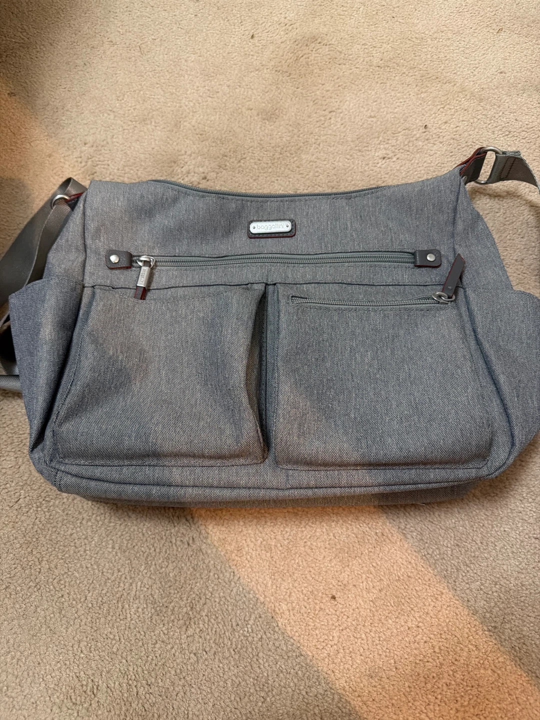 Baggallini grey crossbody bag with pouch