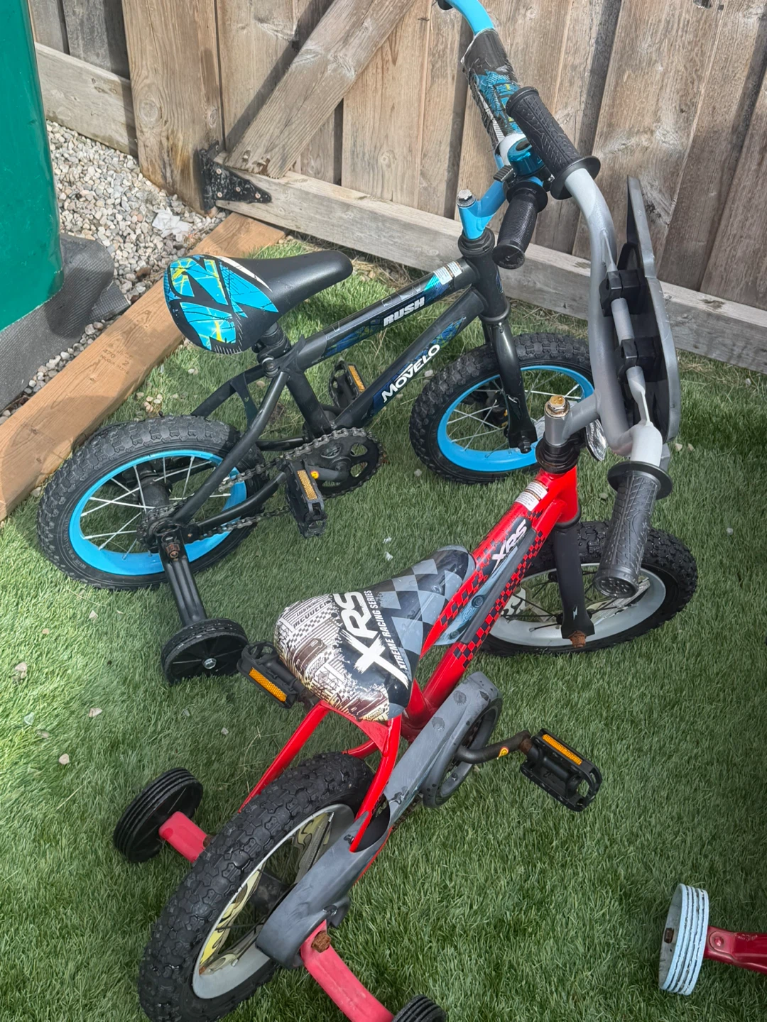 Set of two Movelo and Huffy kids bikes with training wheels