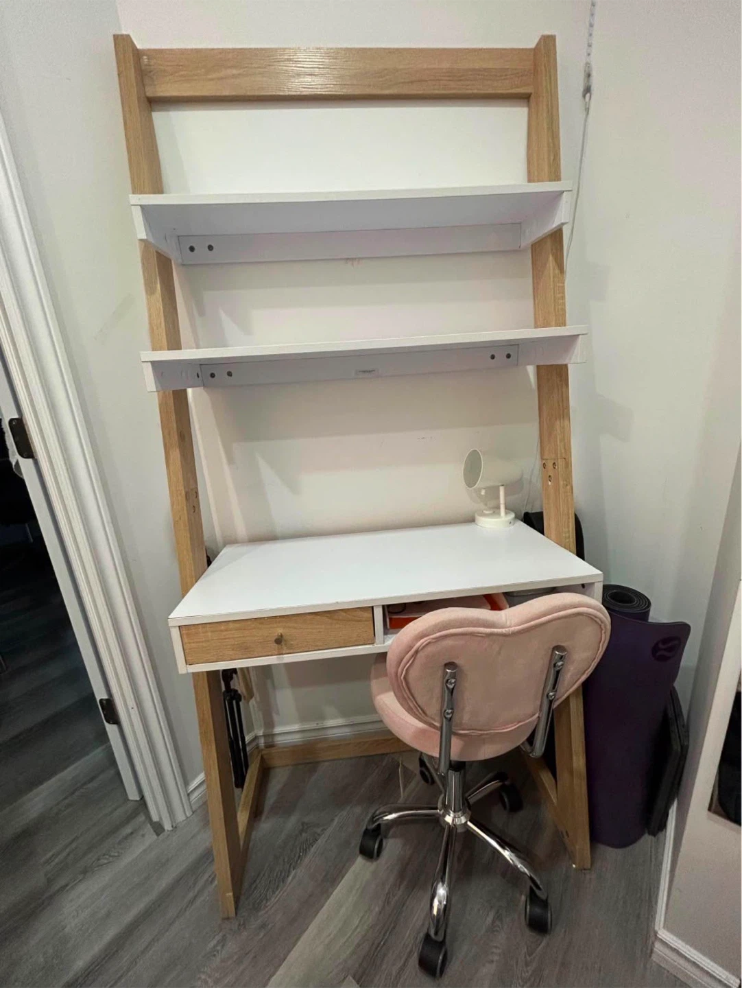 Desk and pink chair