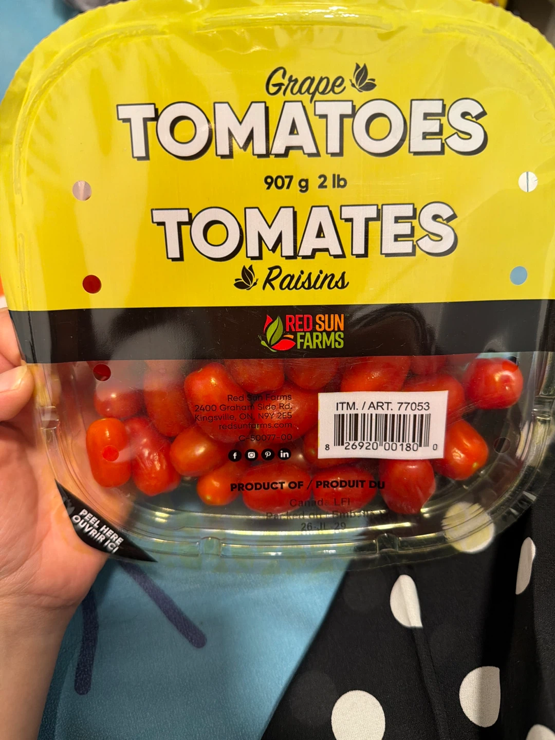 Unopened container of grape tomatoes