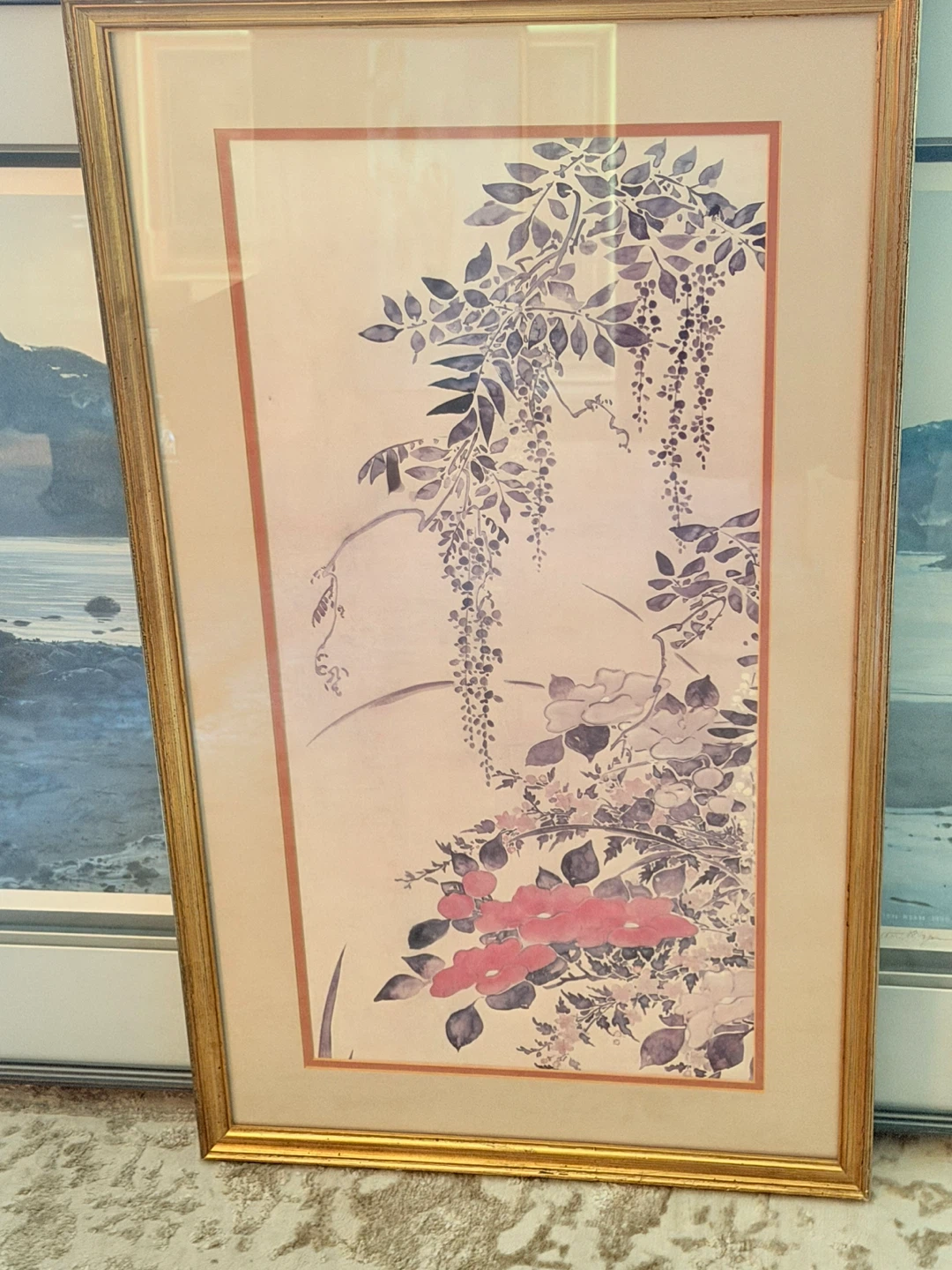 Framed floral print in gold wood frame