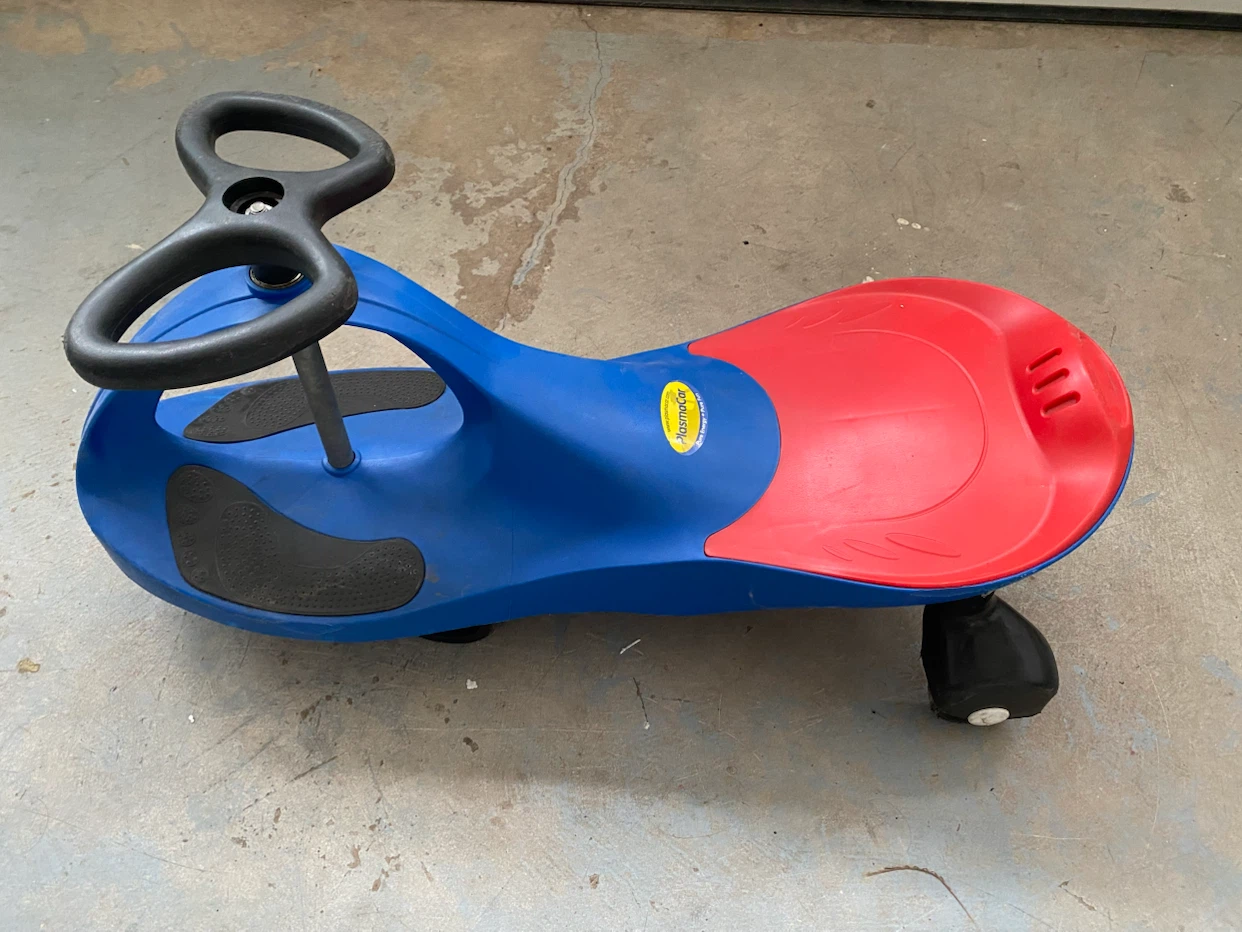 Blue and red PlasmaCar ride-on toy