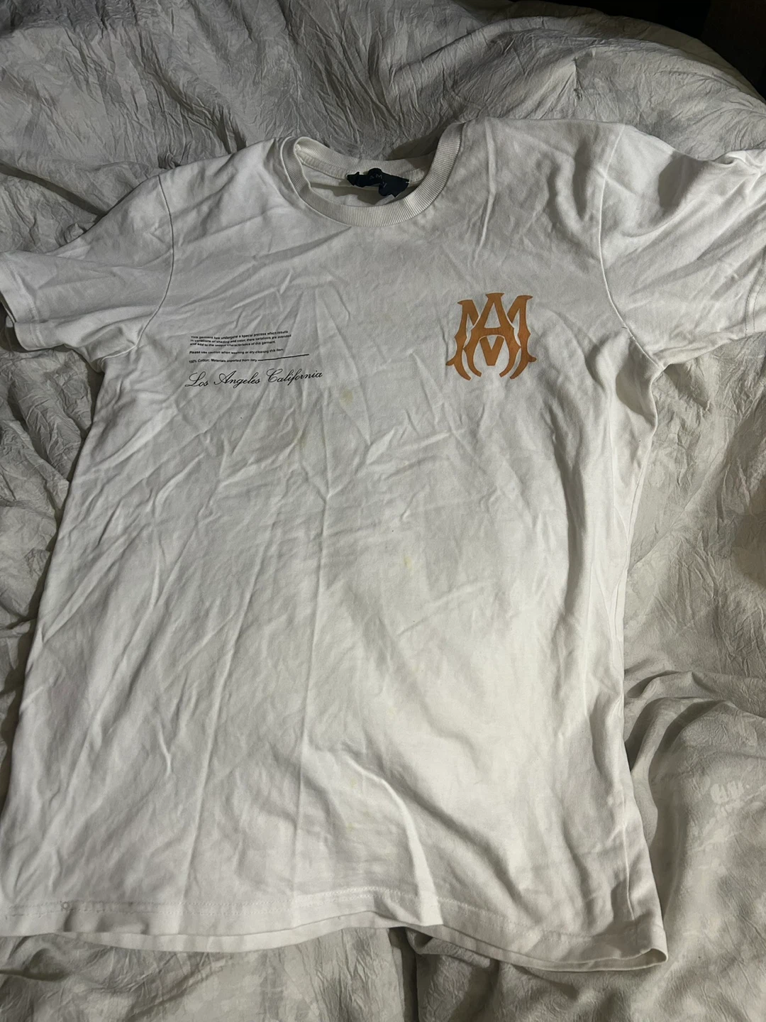 White orange letter Amiri shirt