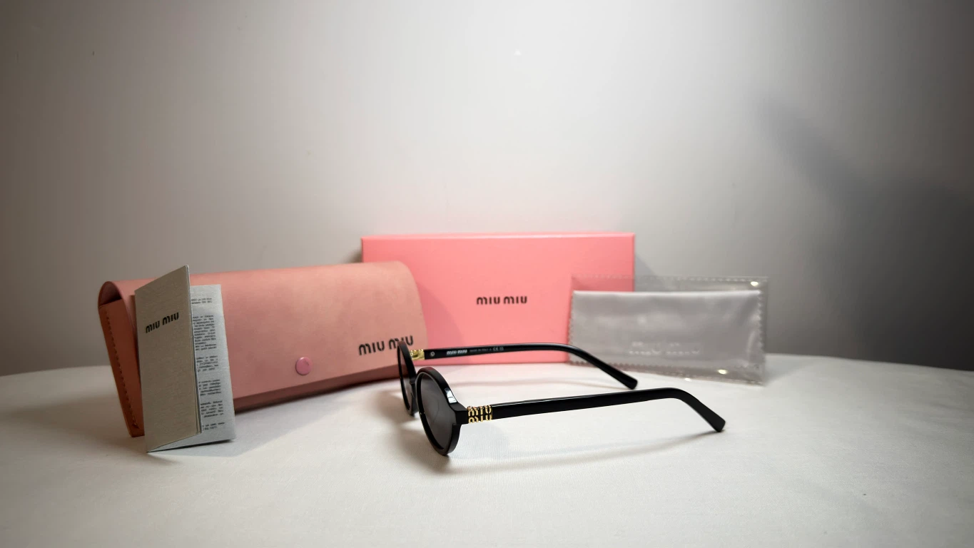 Miu Miu Black Oval Sunglasses