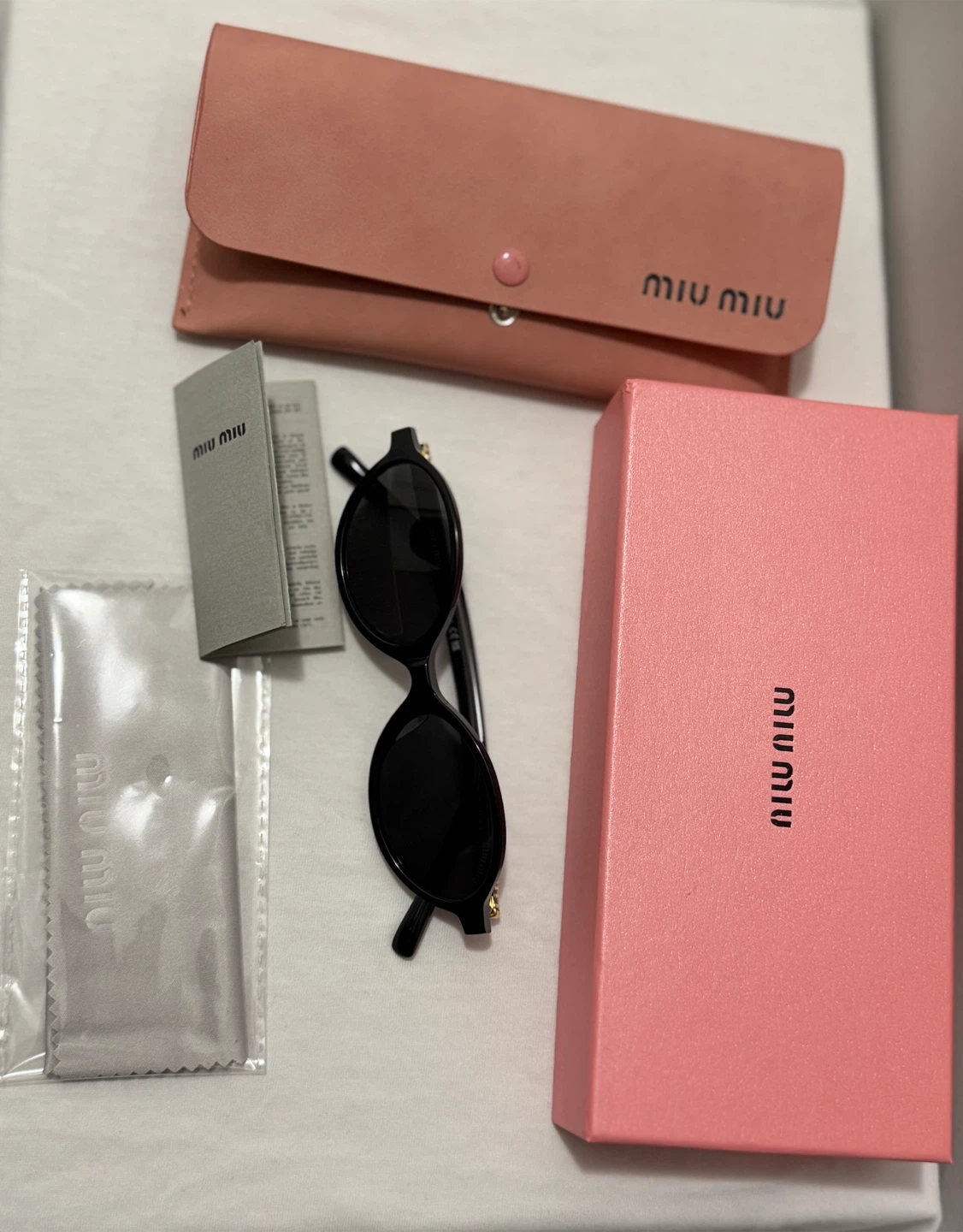 Miu Miu Black Oval Sunglasses - photo 5