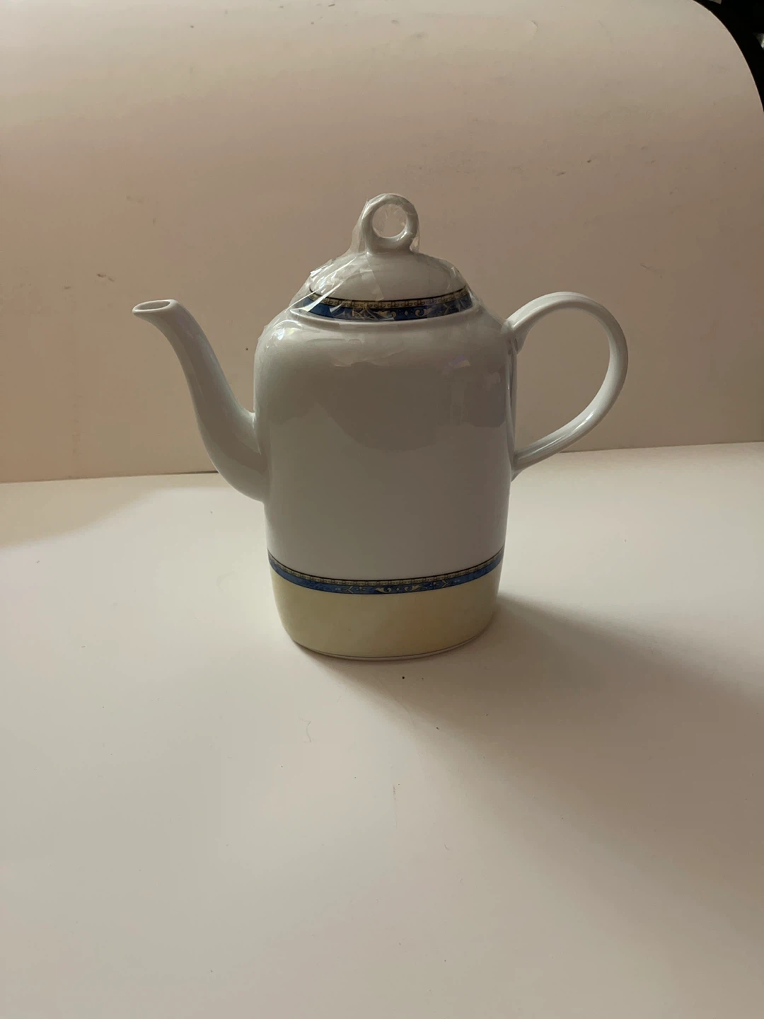 White Ceramic Teapot with Blue and Gold Trim
