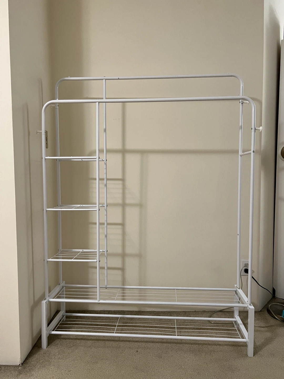 White double rail garment rack with shelves