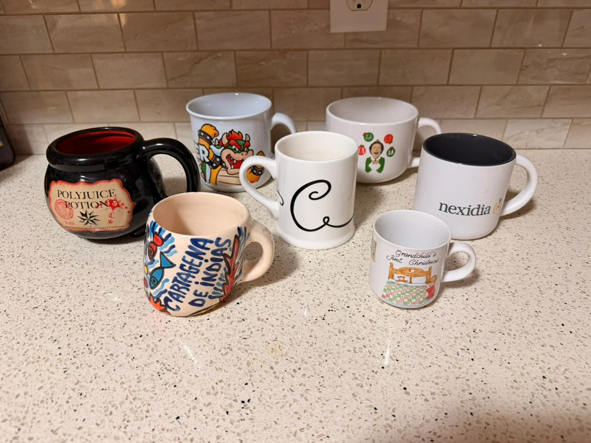 $5 for all!! Assorted collection of seven unique mugs