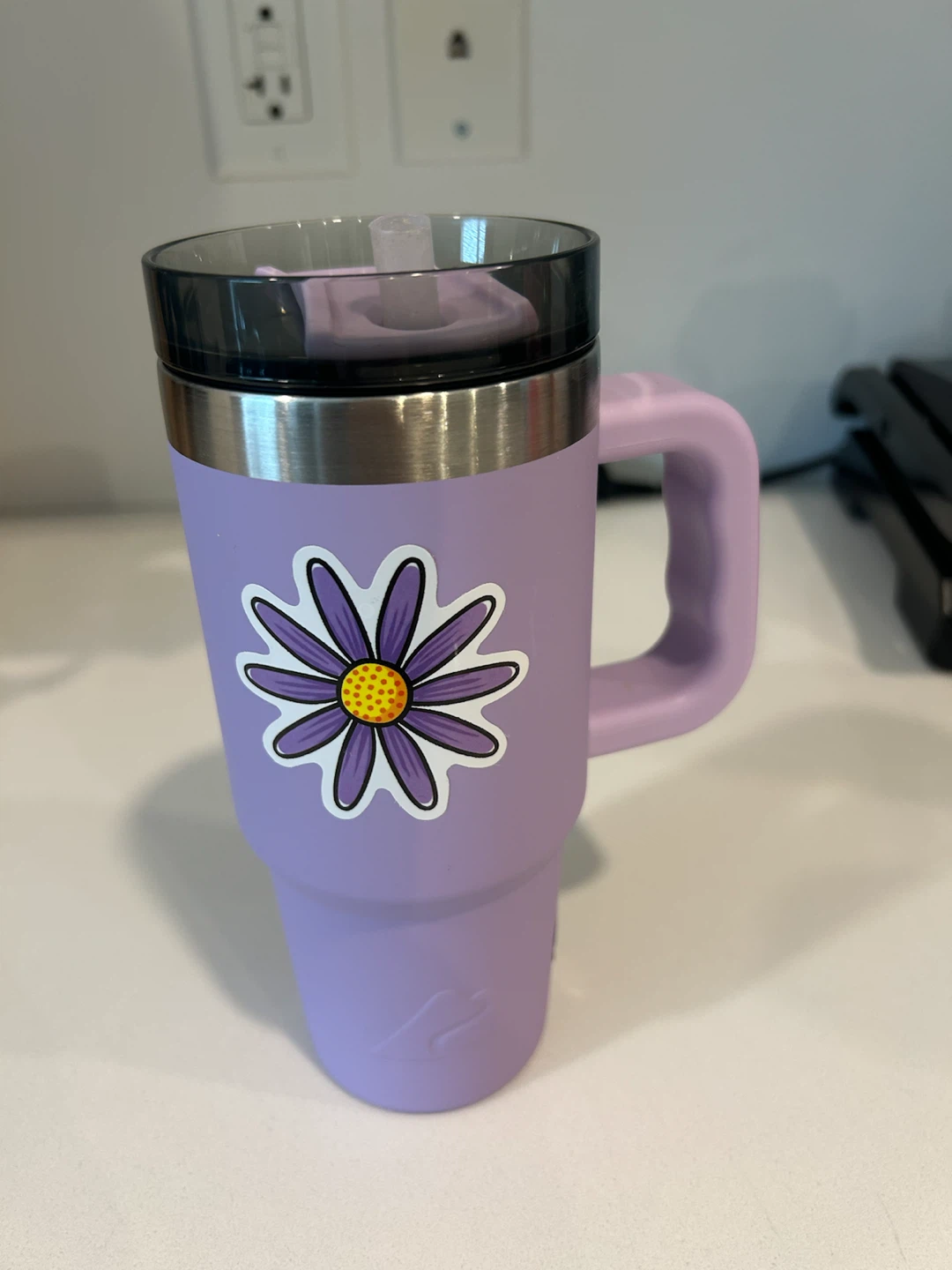 Purple Tumbler with Daisy Sticker
