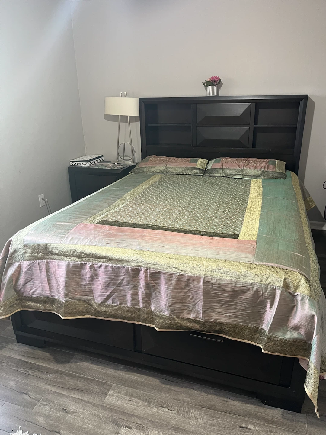 Dark wood queen storage bed frame with bookshelf headboard