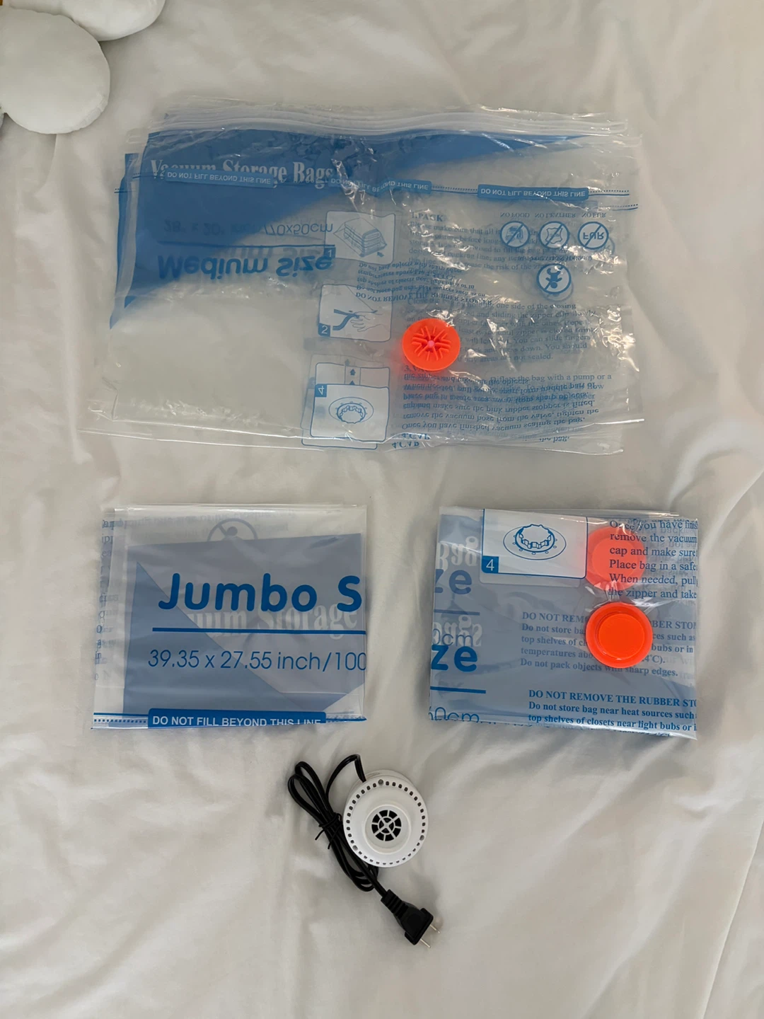 Vacuum storage bags with electric pump