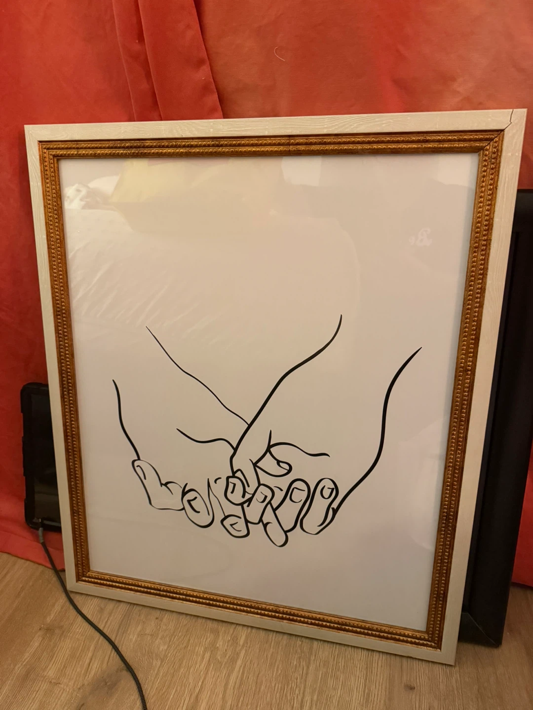 Framed line art print of holding hands