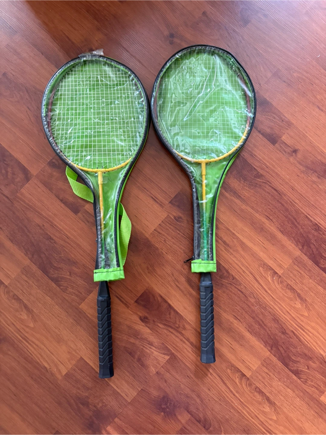 Two Badminton Racquets with Covers