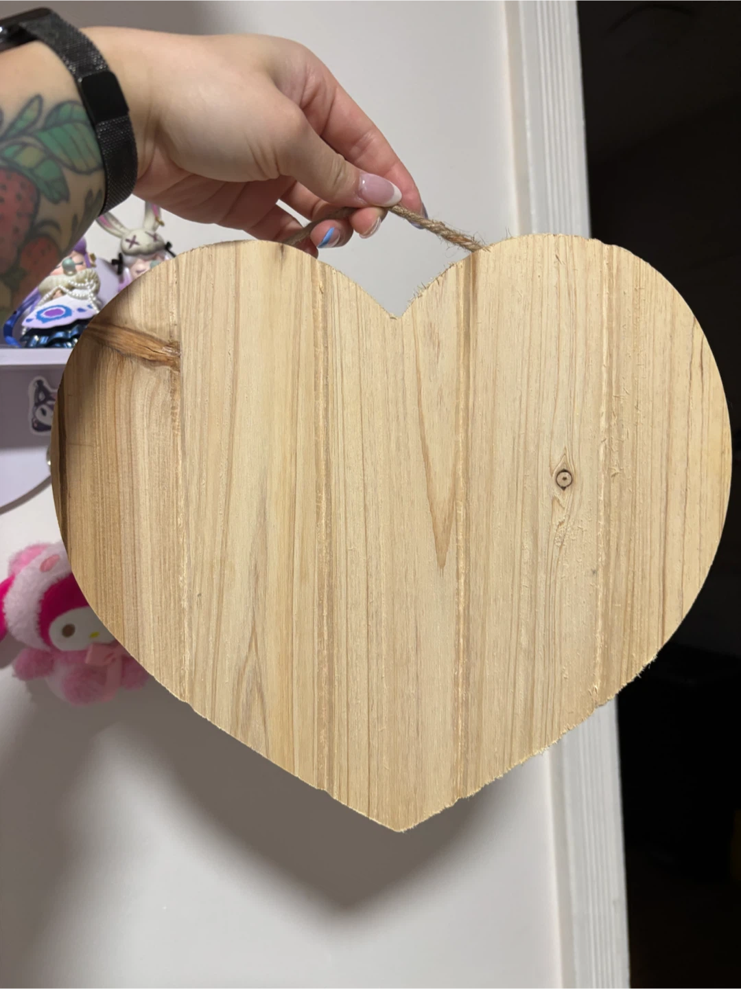 heart-shaped wooden plaque