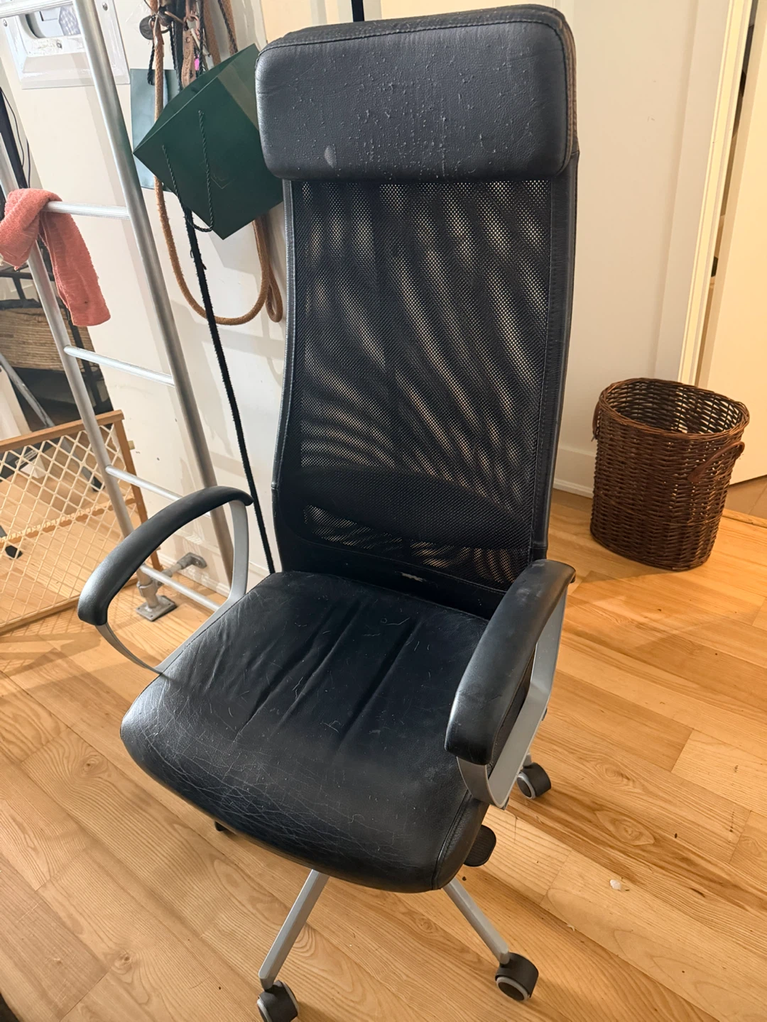 Black Mesh Office Chair with cat scratches