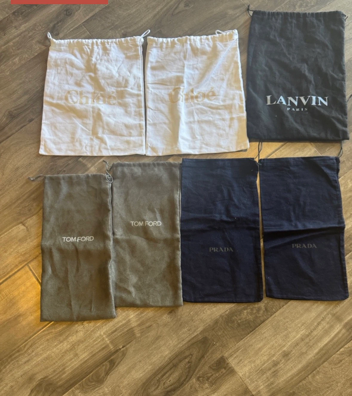 7 x designer shoe dust bags