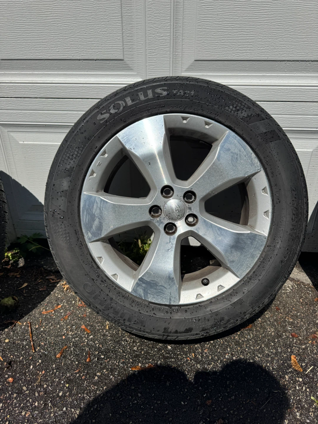 Subaru rims w/Kumho Solus TA31 225/55R17 97V all-season tires. - photo 2