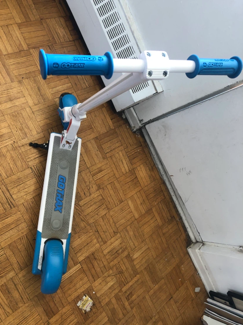 GoTrax Electric Scooter with Blue Handle Grips