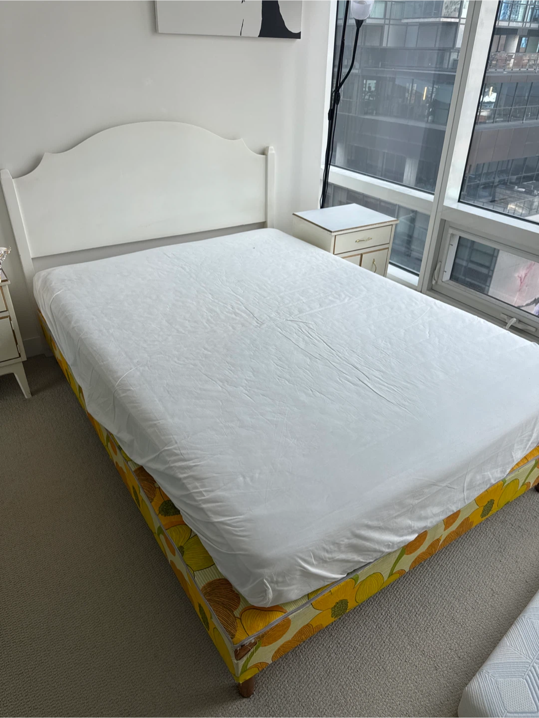 Double Bed with White Headboard and Floral Bed Frame