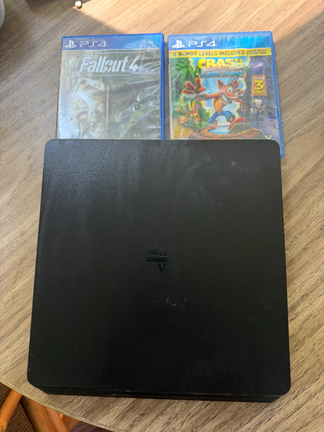 PS4 with Games - Crash Bandicoot N Sane Trilogy & Fallout 4