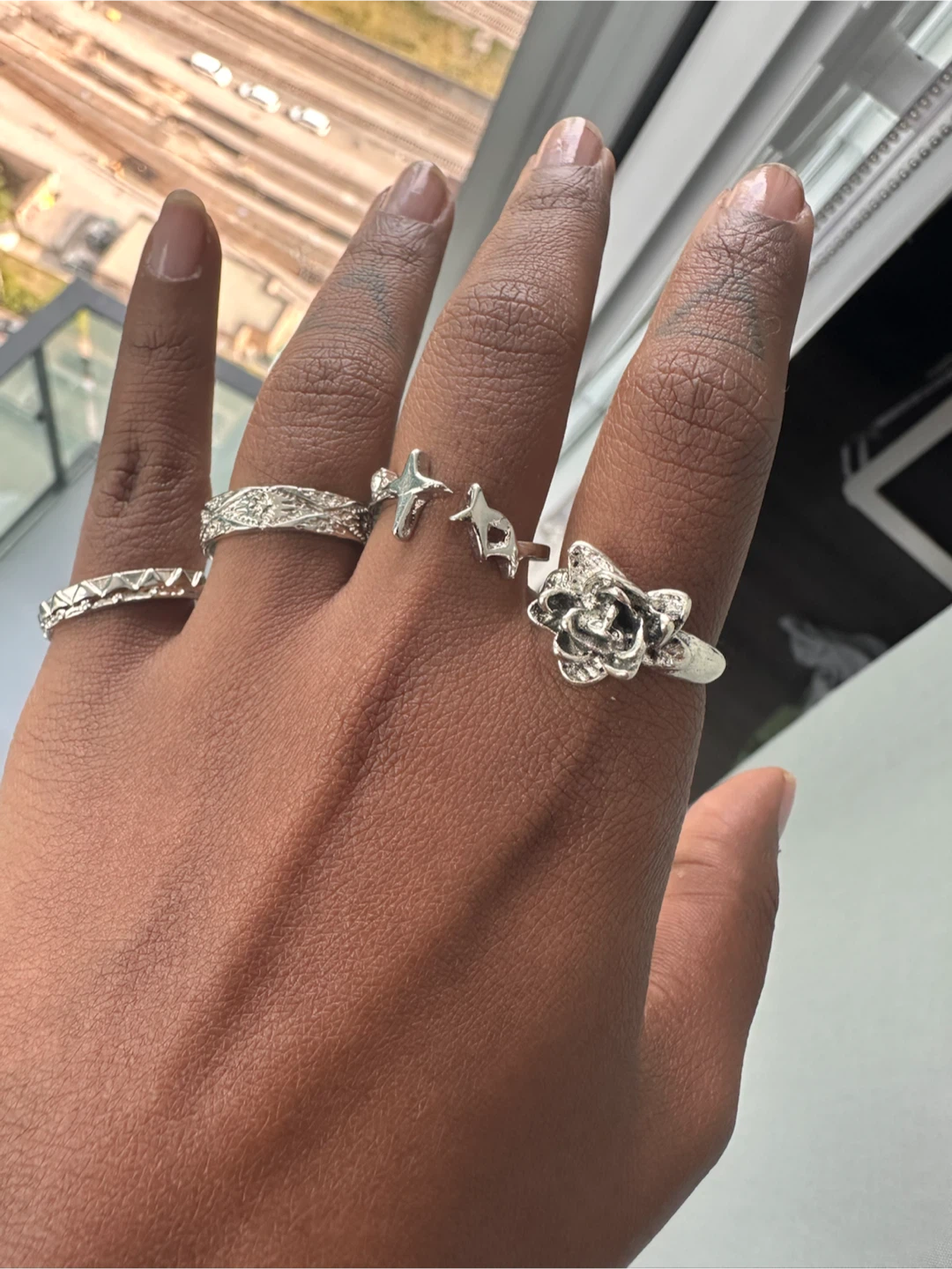 Assorted Silver-Tone Rings with Rose and Star Designs