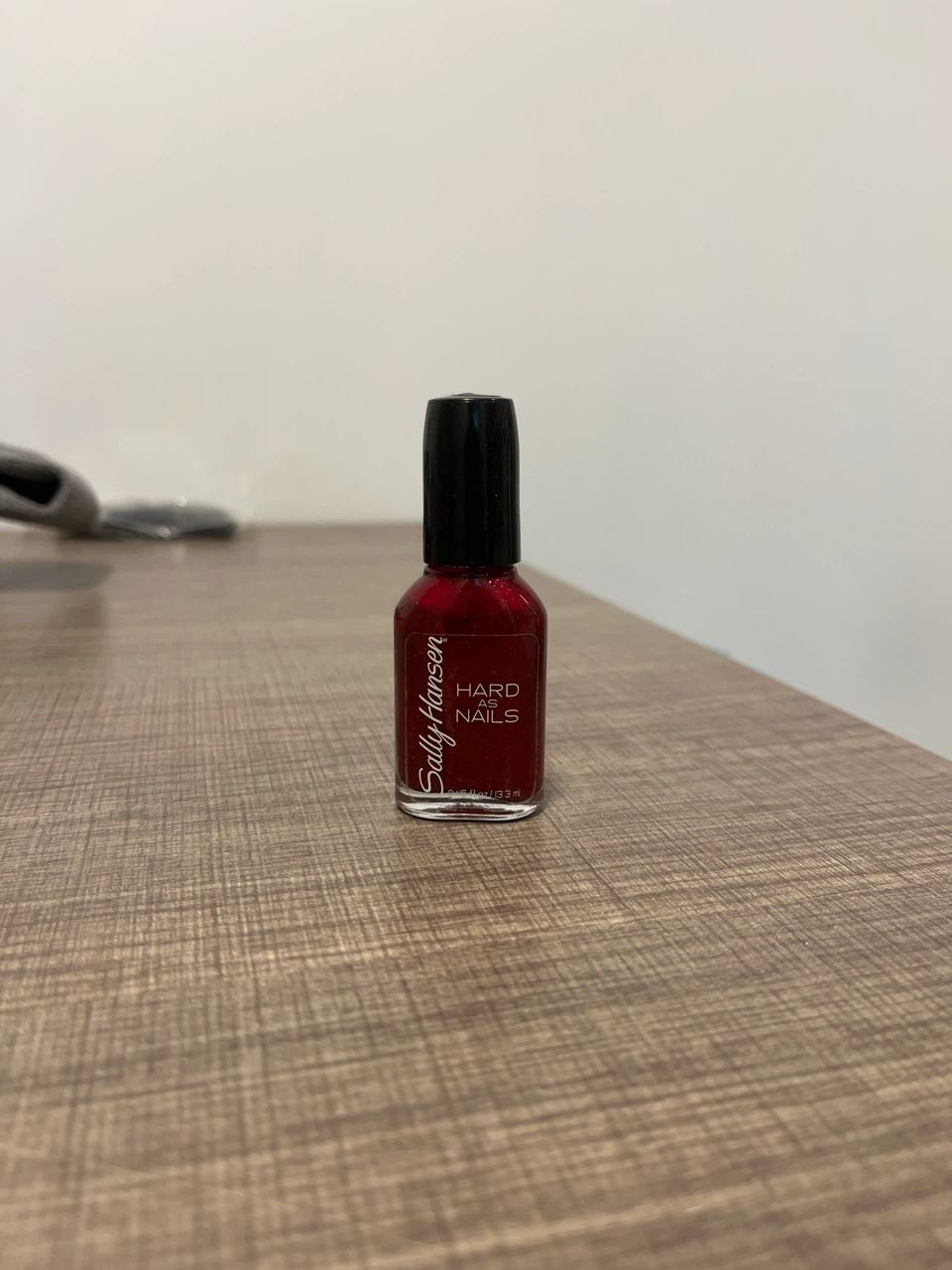 Red sparkly nail polish