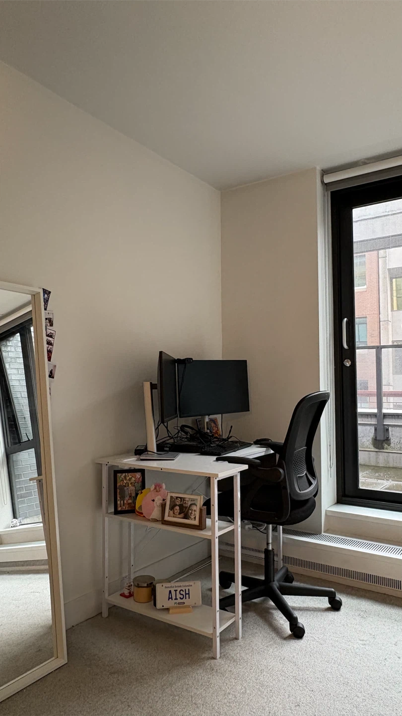 Desk + Black Ergonomic Office Chair with Mesh Back