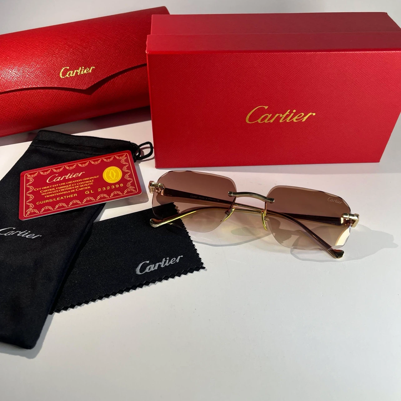 Cartier Rimless Sunglasses Gold Leopard Detail