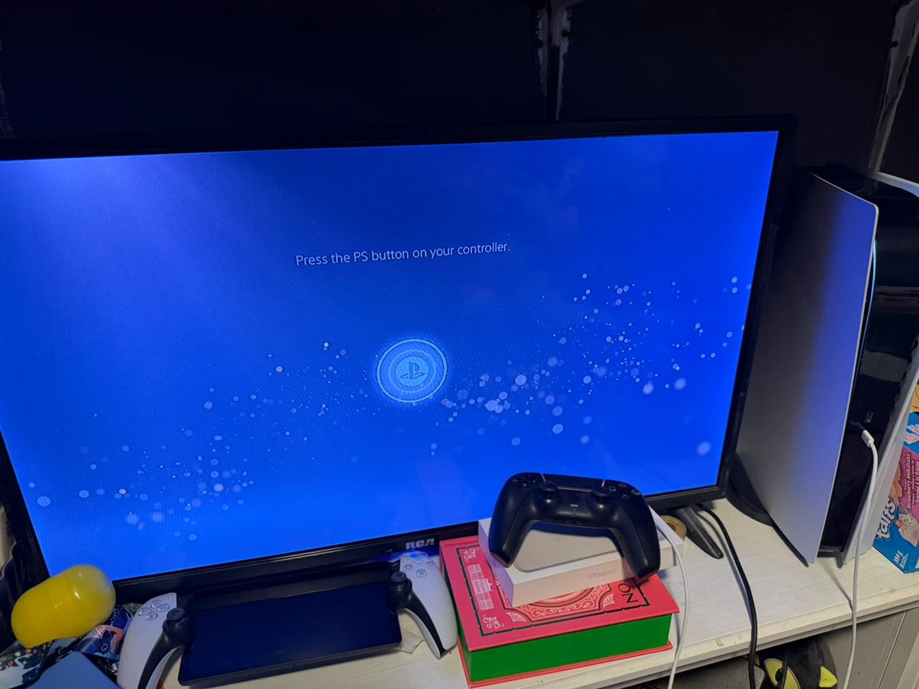 PlayStation 5 with controller and portal