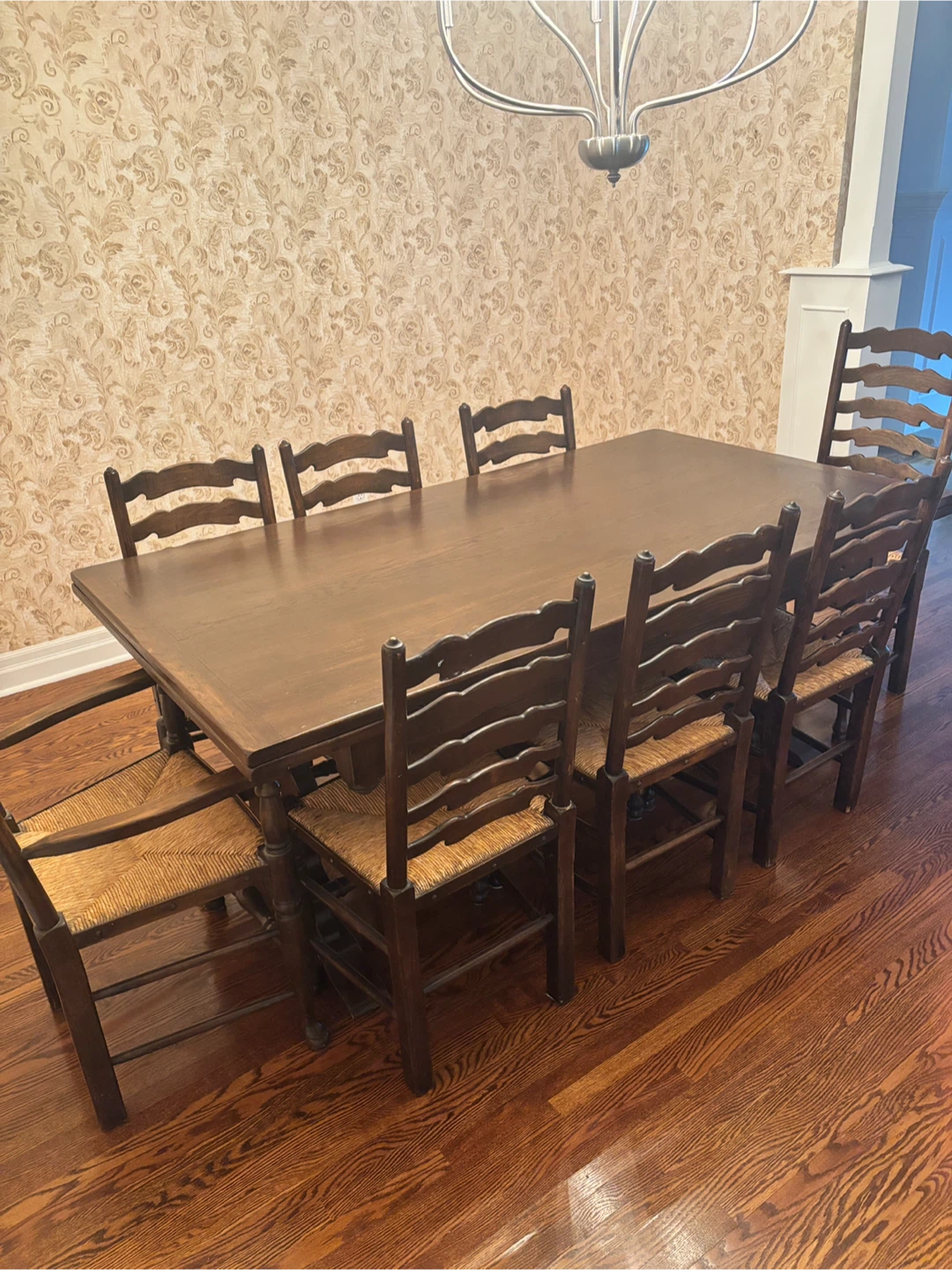 Dark walnut dining room table and 8 matching chairs