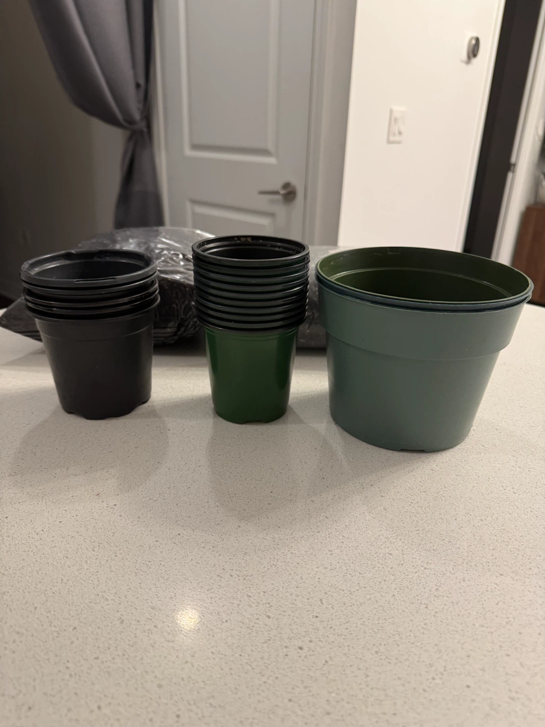 Assorted Plant Pots and Soil