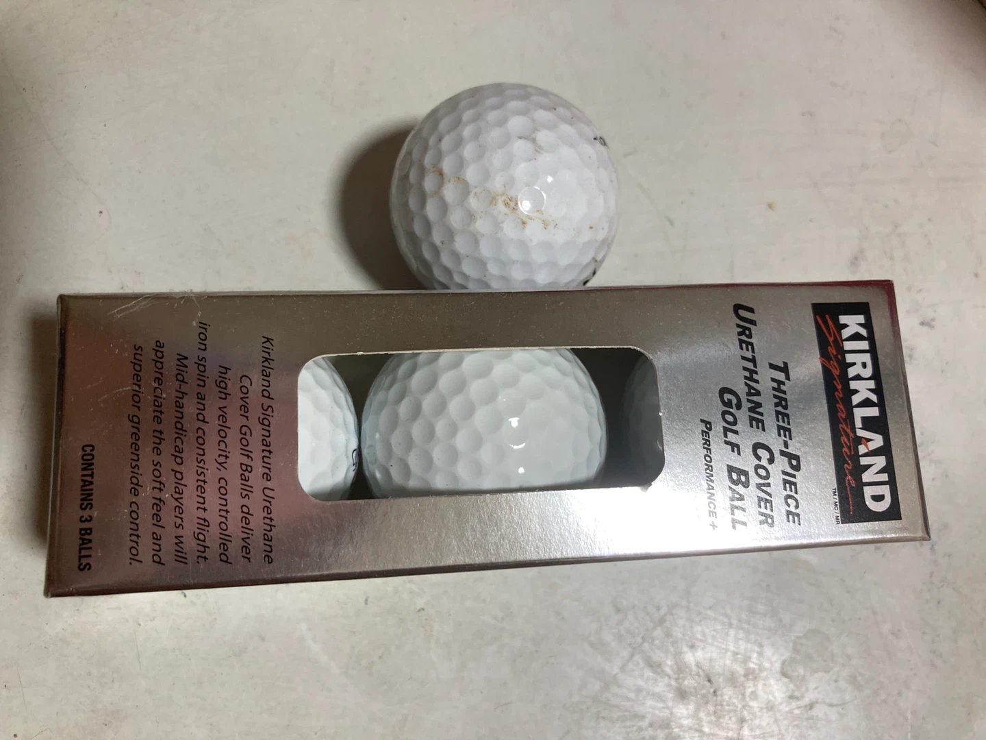 Three golf balls