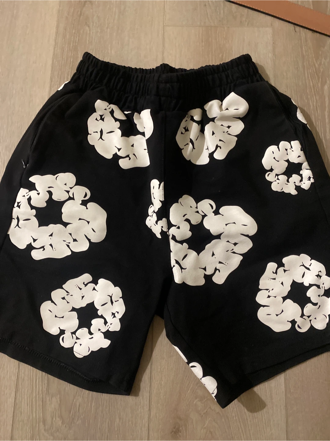 Black shorts with white graphic print