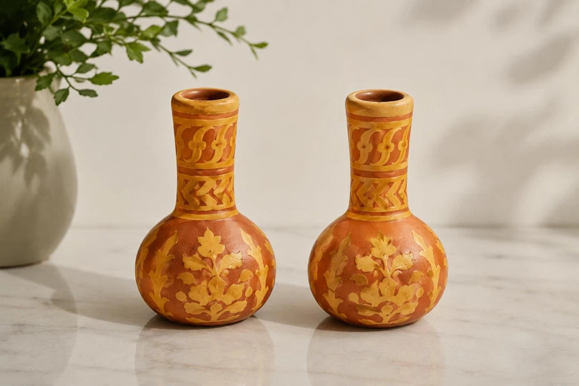 Pair of Decorative Orange Vases with Embossed Design