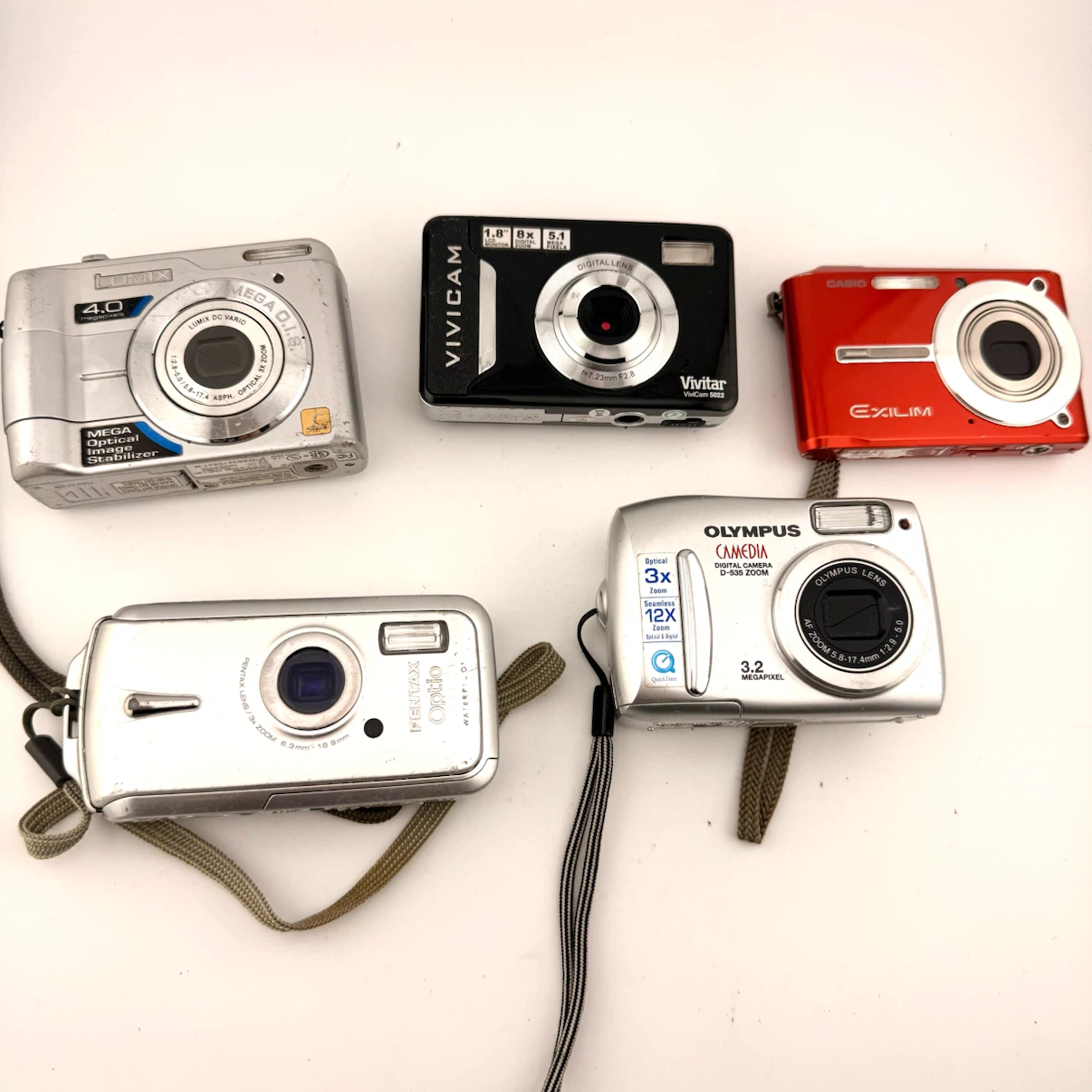 Lot of 4 Digital Cameras: Lumix, Vivitar, Casio, Olympus, Pentax