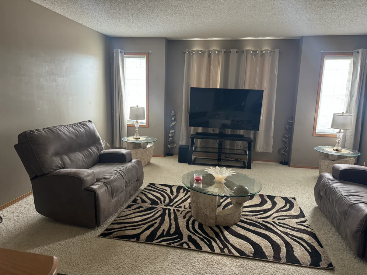 Brown reclining couches