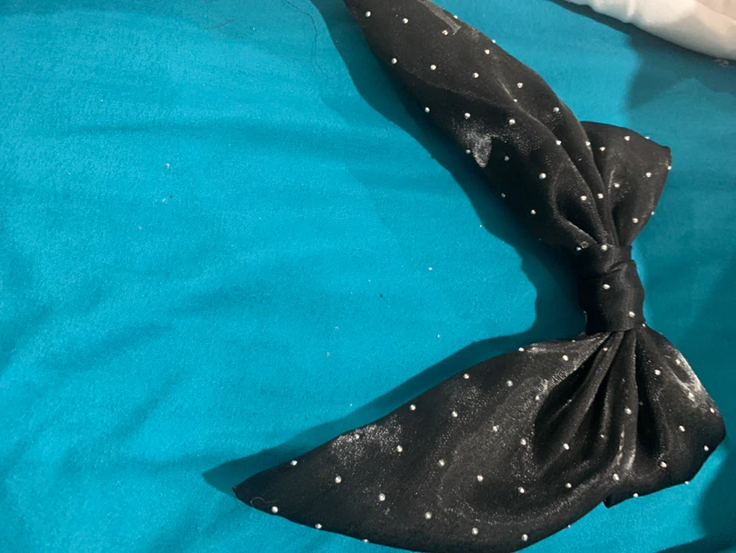 Black polka dot bow
