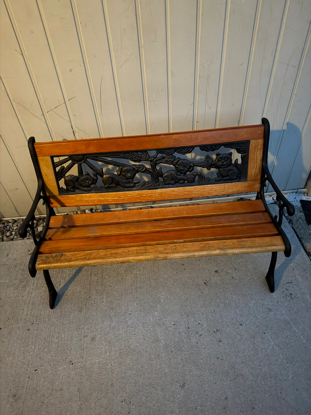 Outdoor Bench with Cast Iron Animal Accents