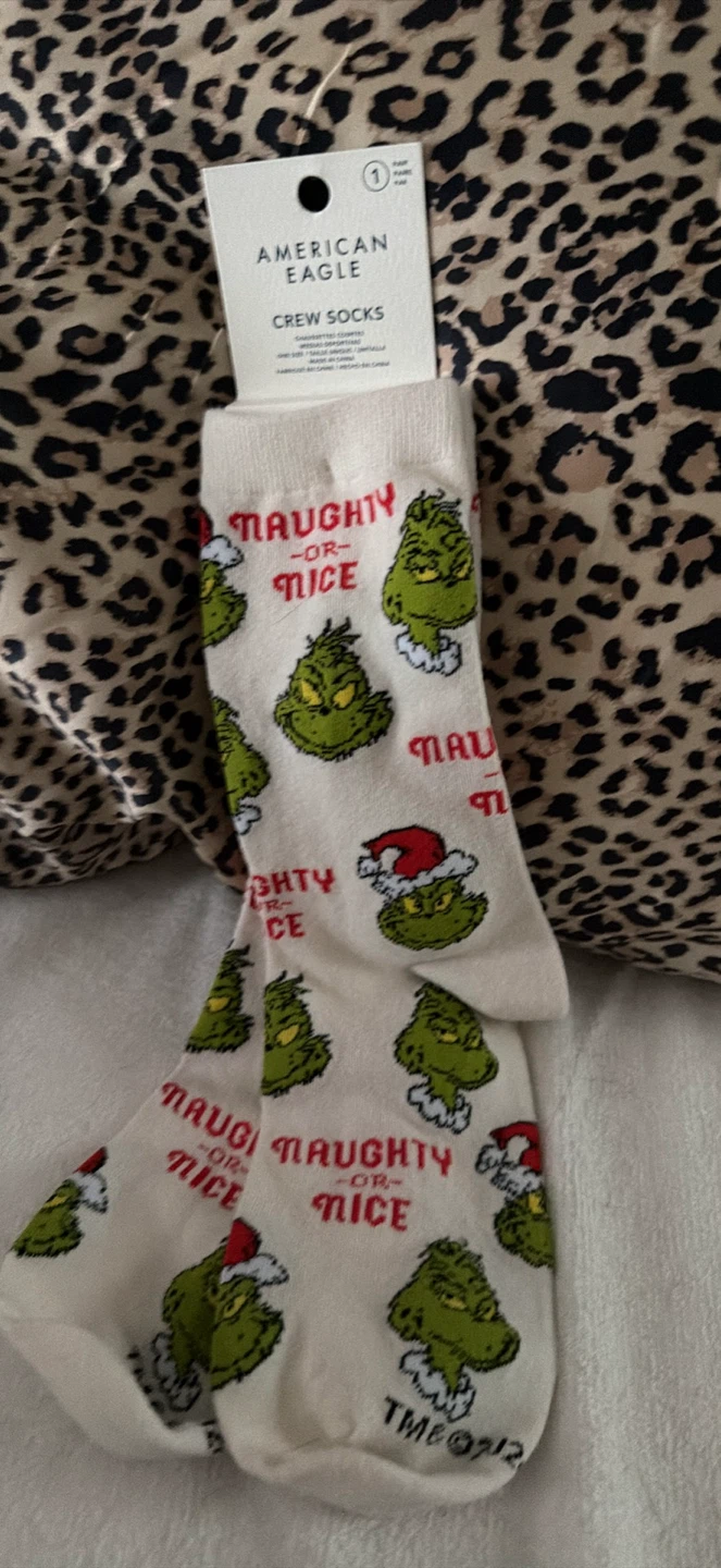 American eagle grinch socks tags on