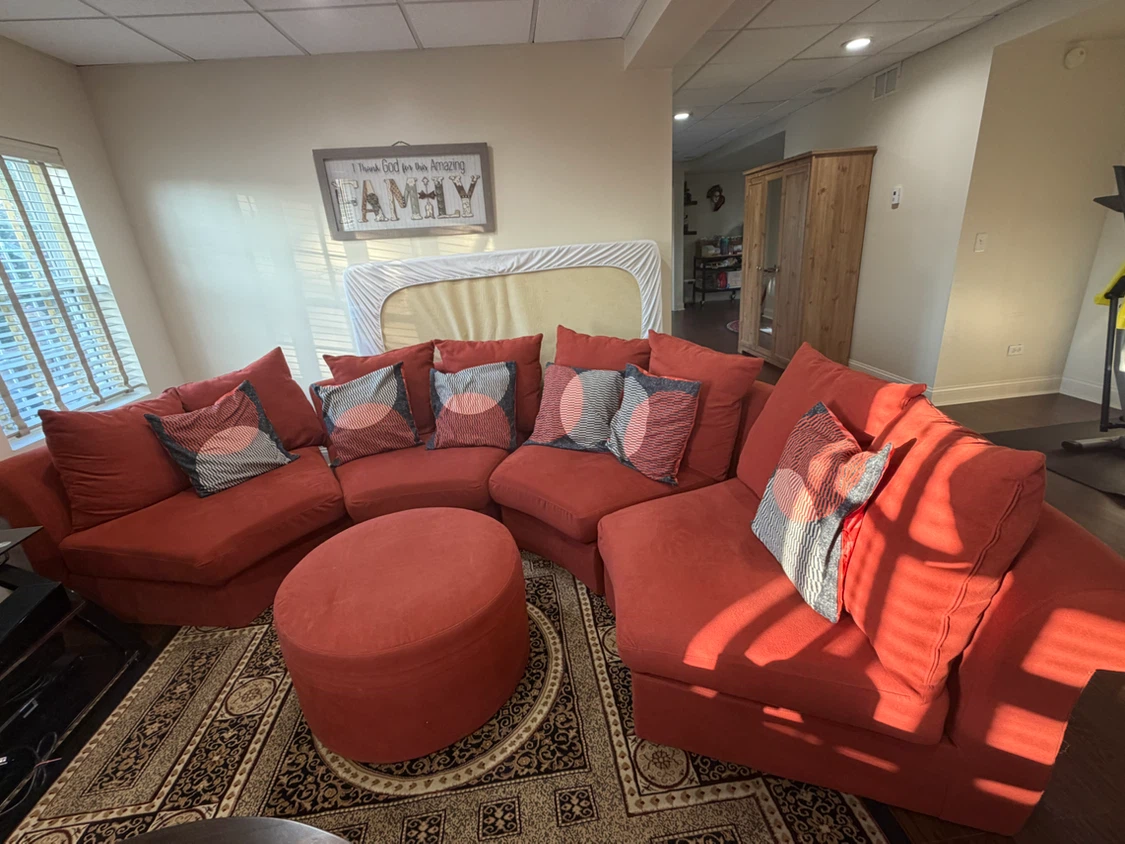Semi circle Rust color fabric sofa with ottoman and cushions