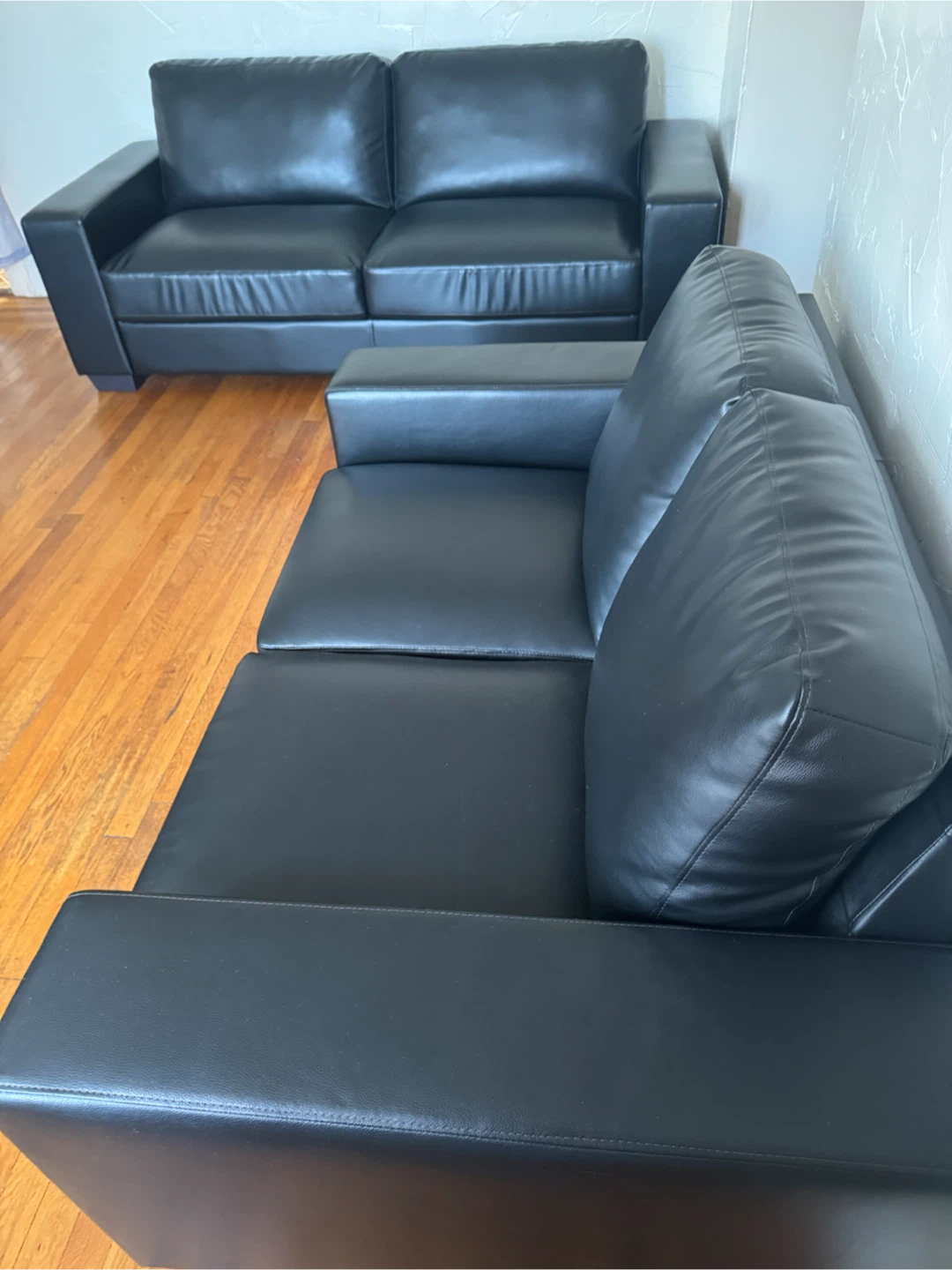 2 black sofa
